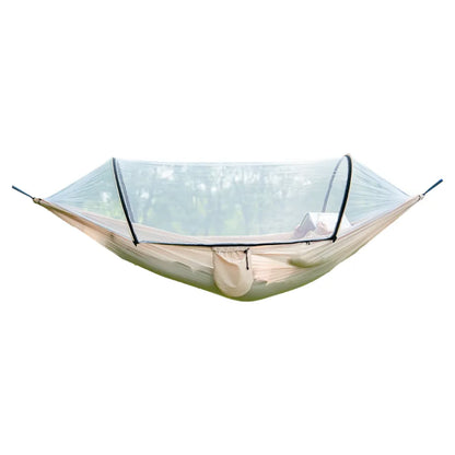 Compact camping hammock with mosquito net, perfect for backpacking and travel.
