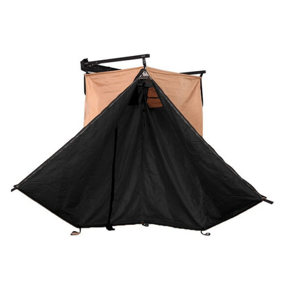 Privacy shelter attached to an SUV, demonstrating its use as an outdoor shower or changing tent.