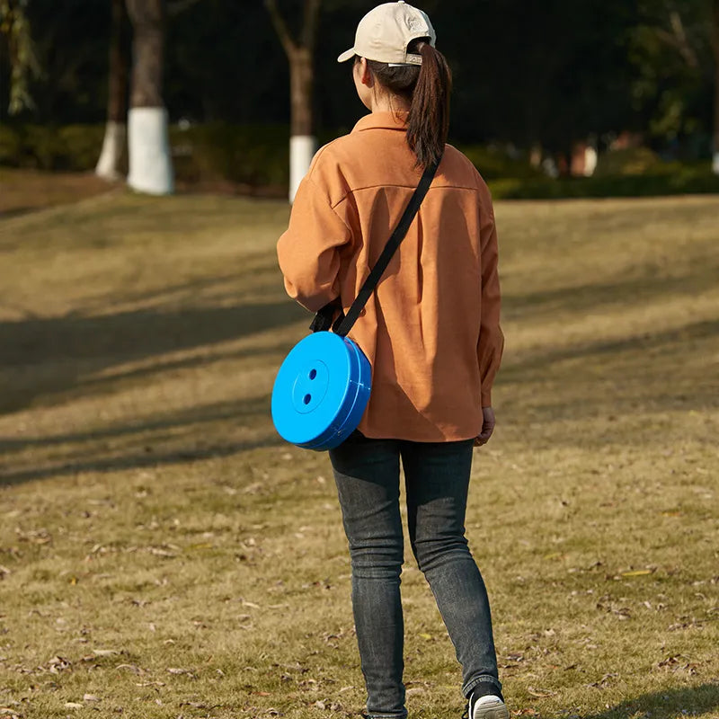 Collapsible stool demonstrating its small packed size, ideal for backpackers and hikers