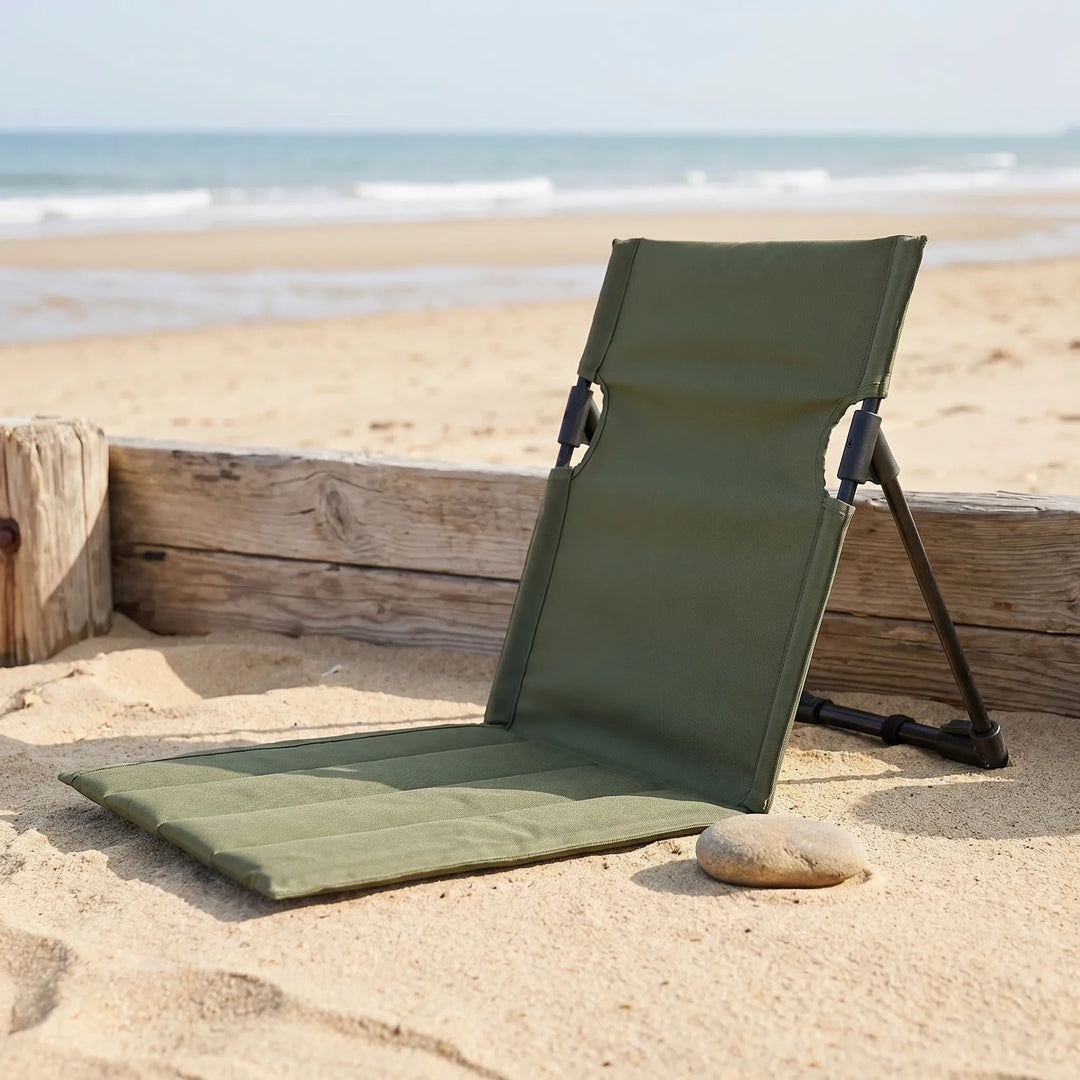 Unisex portable ground chair for camping, beach & picnics. Lightweight, folding outdoor comfort.