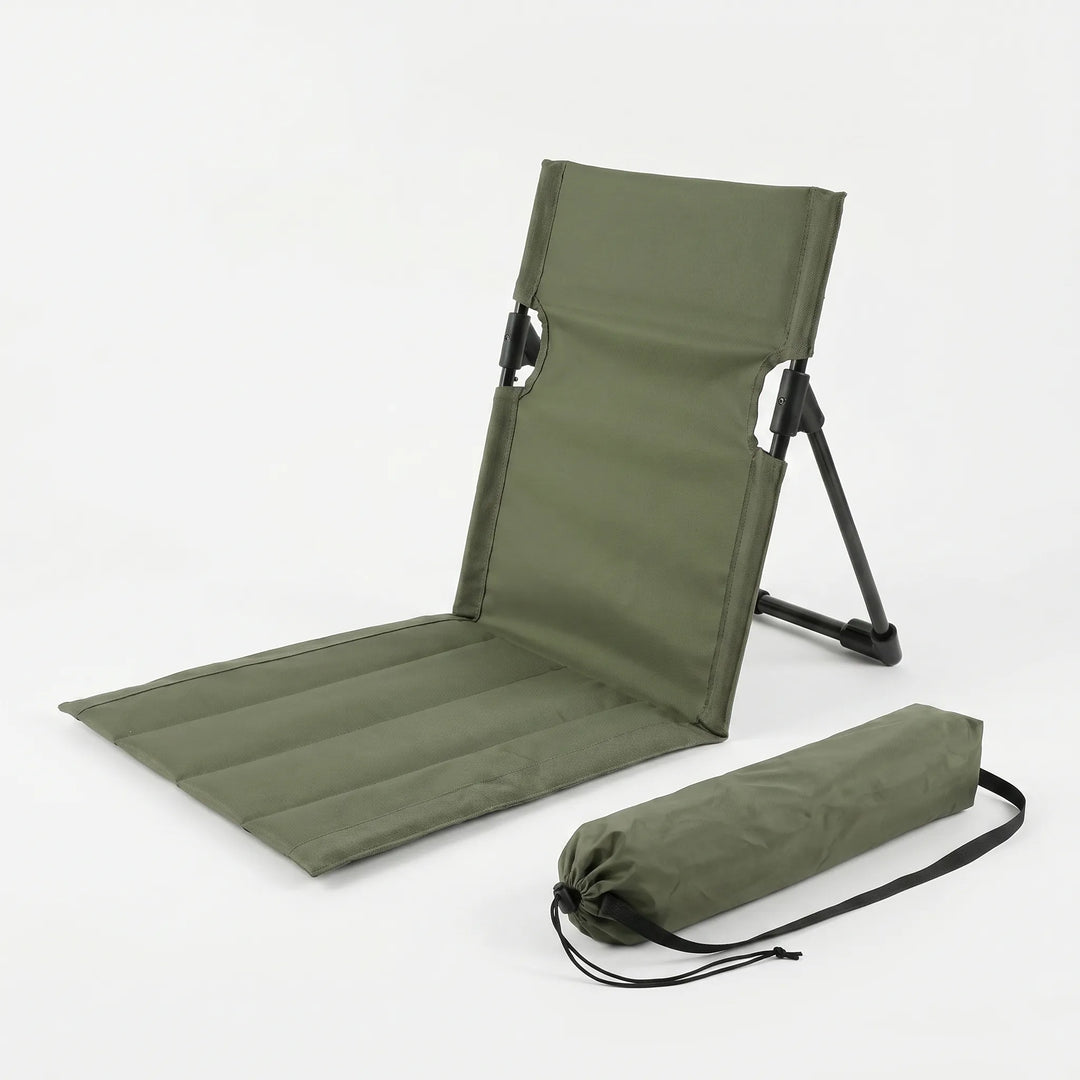 Unisex portable outdoor ground chair. Folding design for easy travel, perfect as a camping or beach seat.