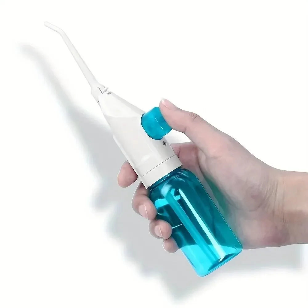 Ergonomic portable high-pressure water flosser held comfortably, designed for easy oral care & dental hygiene.