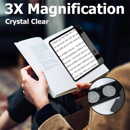 Person reading a book with a portable LED magnifier, enhancing clarity for improved vision.
