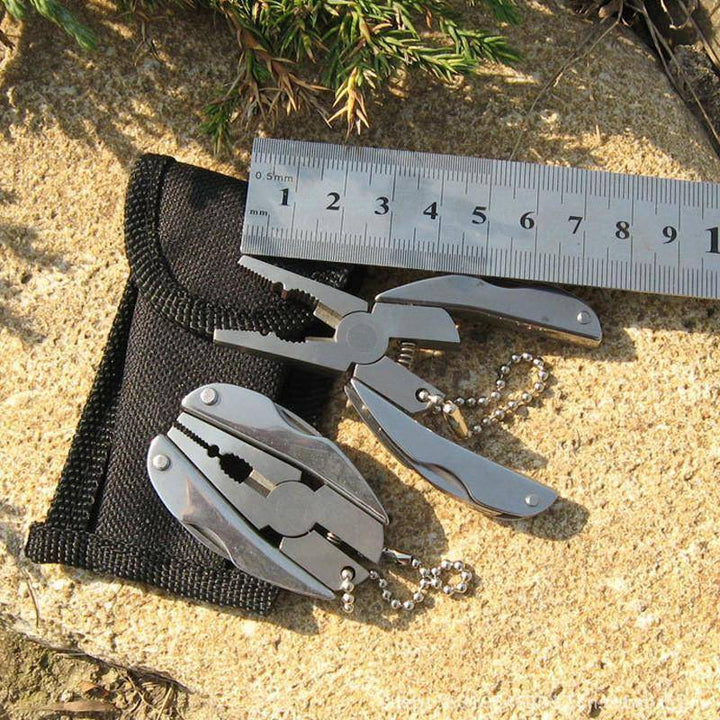 Utility folding plier with various tools, essential outdoor gear for any explorer
