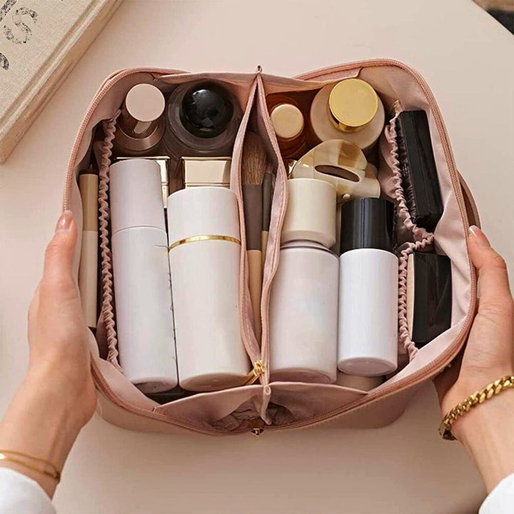 Unisex travel makeup bag for organizing cosmetics on the go. Portable vanity case for beauty products.