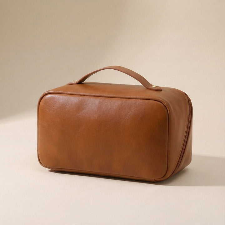 Unisex portable makeup accessory organizer. Spacious travel beauty storage case for all your essentials.