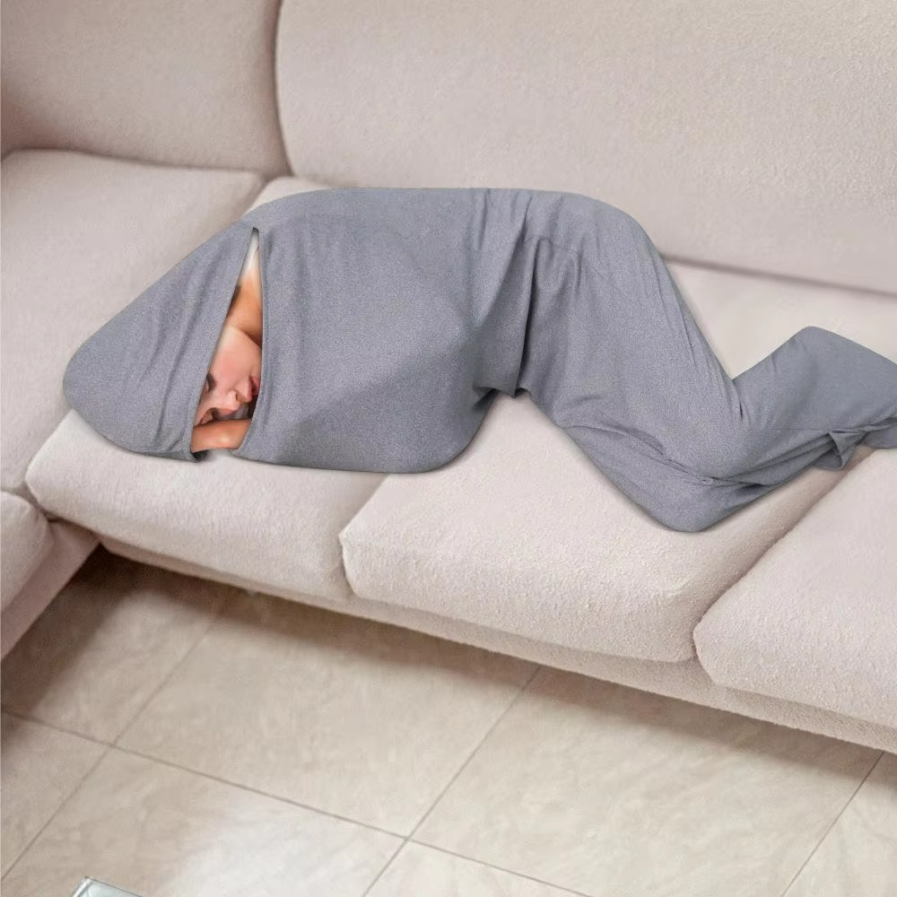 Unisex stretch travel sleeping bag & blanket, offering portable comfort for adults & kids on trips.