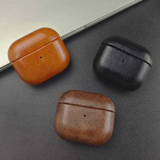 Unisex premium full-grain leather protective earbud case. Slim, scratch-resistant tech accessory for earphones.