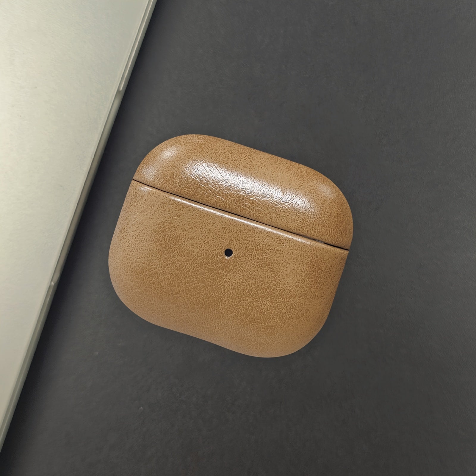Premium unisex full-grain leather earbud case. Offers superior protection & supports wireless charging.