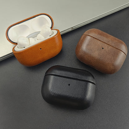 Durable full-grain leather earbud case with drop protection. Premium tech accessory for wireless charging.