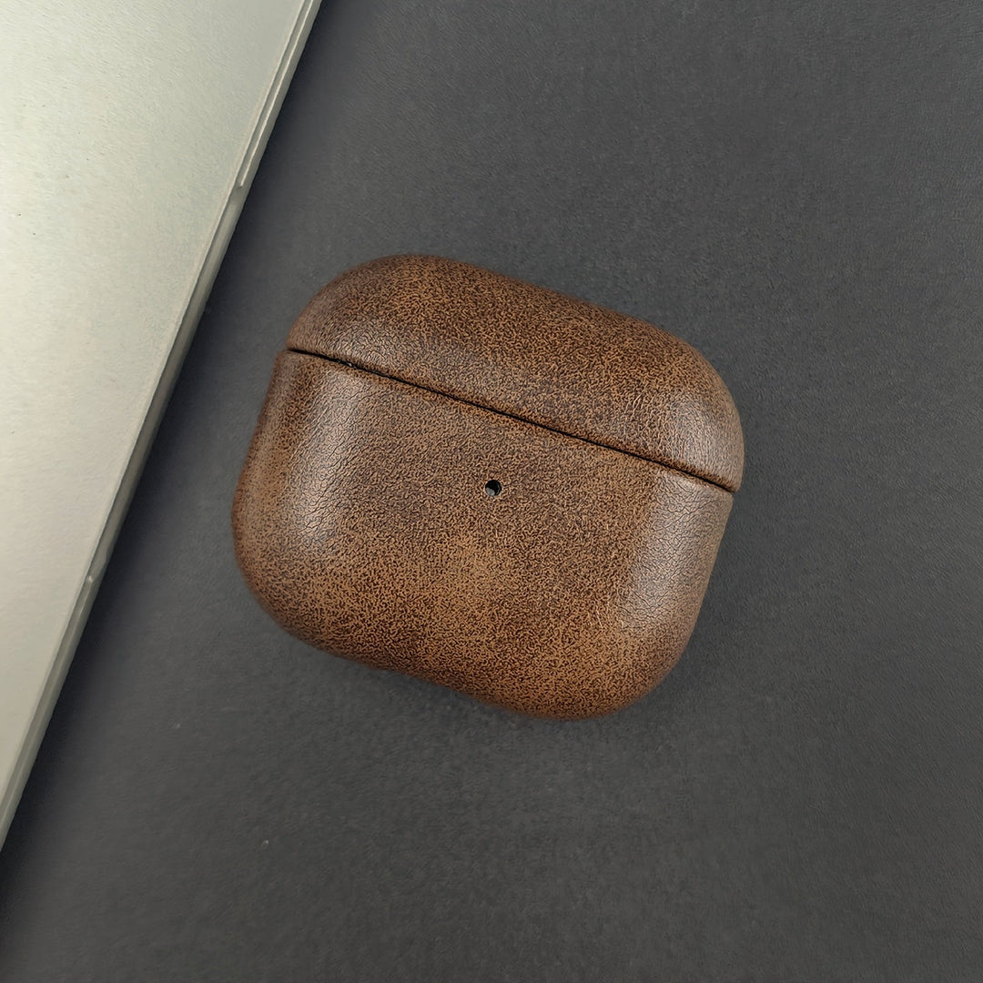 Unisex premium protective earbud case crafted from full-grain leather. Slim & durable tech accessory.