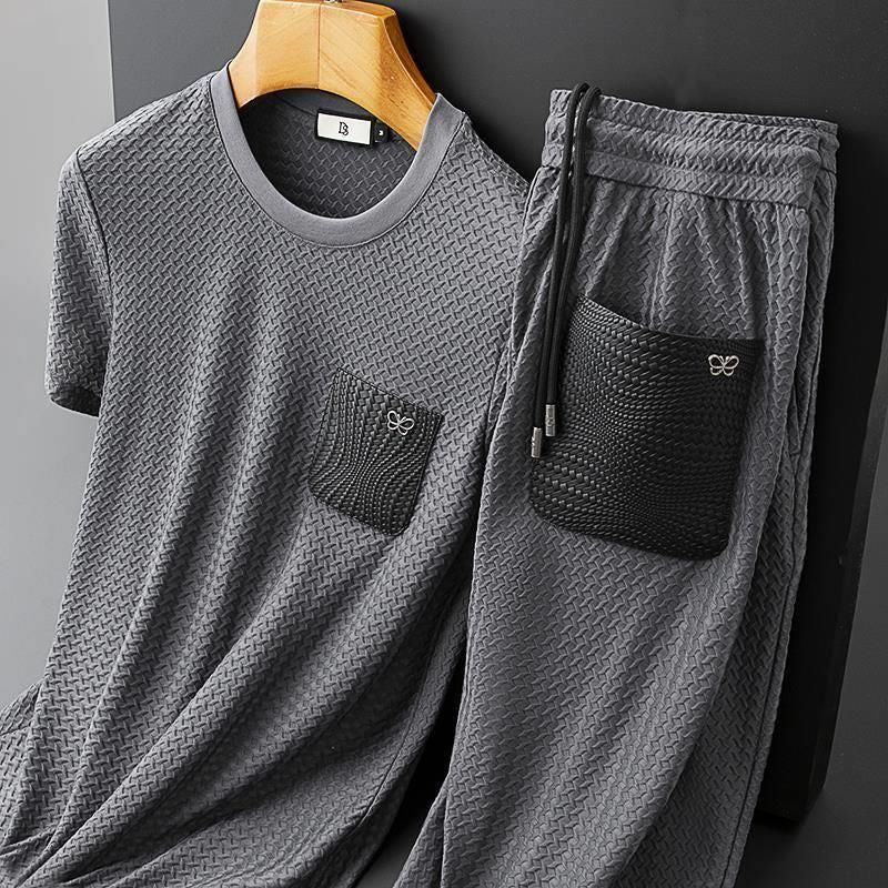 Premium jacquard lounge set, jet black, styled for unisex everyday comfort and luxury.