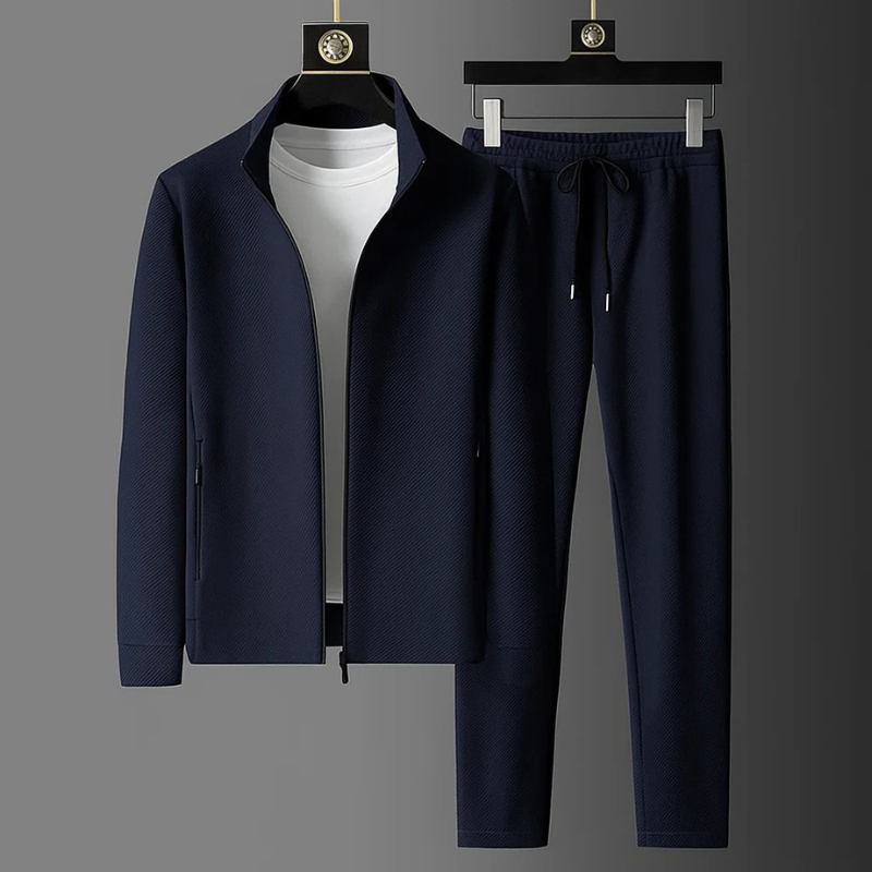 Model wearing a premium unisex tracksuit set, featuring a sporty jogger and matching hoodie for ultimate comfort.