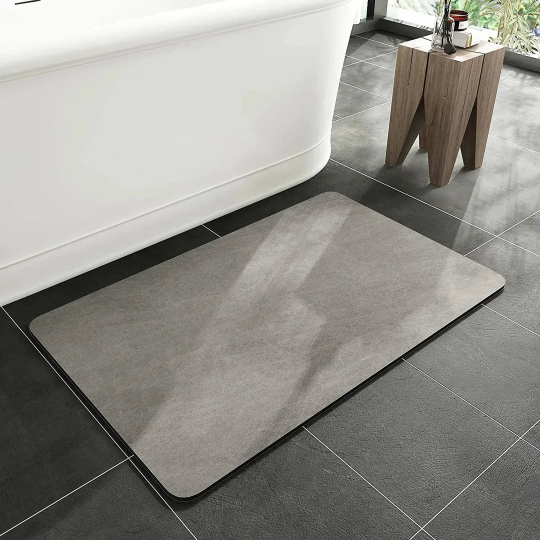 Natural eco-friendly diatomite bath mat. Quick-dry and anti-slip design for a sustainable modern bathroom.