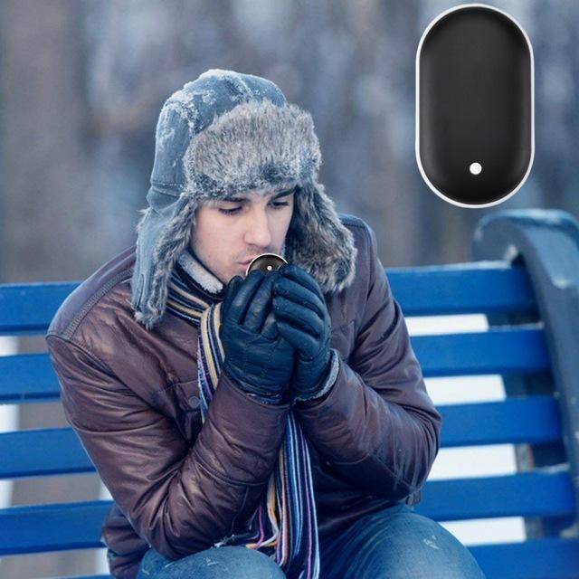 Portable USB electric hand warmer and power bank, ideal for camping and cold weather hiking