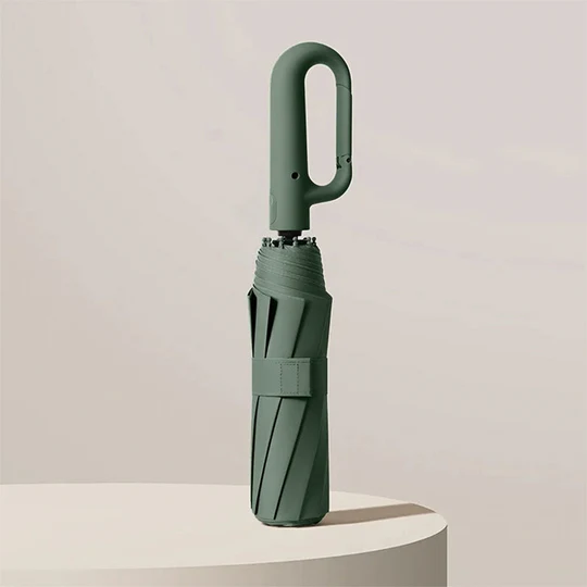 Reliable weatherproof travel umbrella. Reinforced, windproof, UV protected, and automatic for portable rain gear.