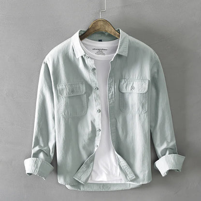 Relaxed fit unisex capri shirt for summer. Effortless style for men and women, perfect for casual button-down comfort.