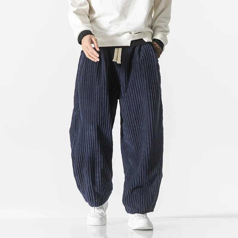 Navy blue unisex relaxed fit casual pants, comfortable and stylish for everyday wear.