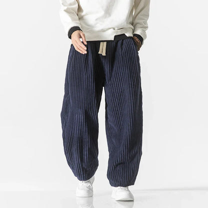 Navy blue unisex relaxed fit casual pants, comfortable and stylish for everyday wear.