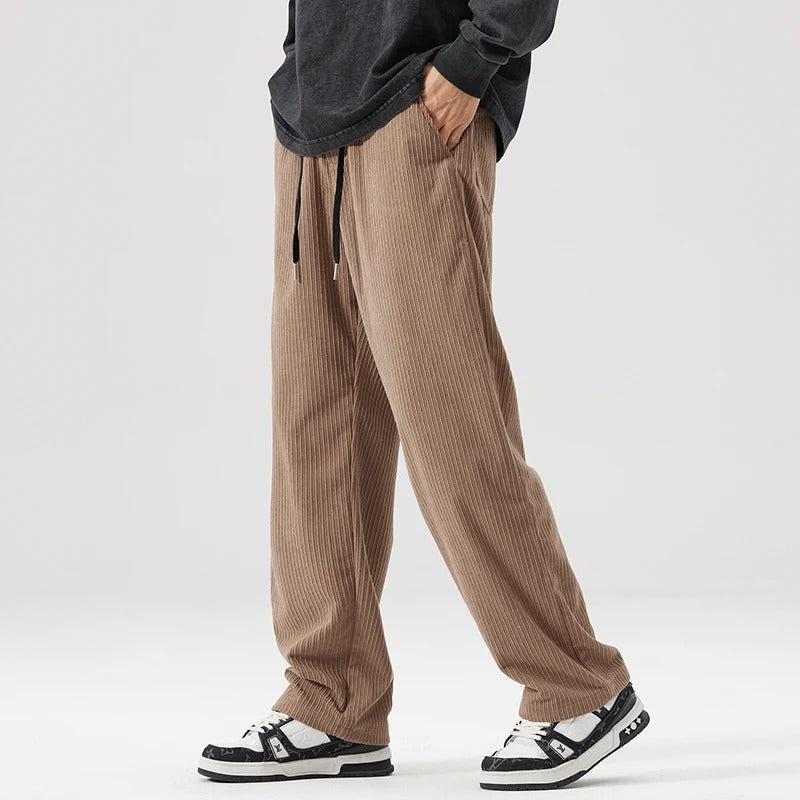 Soft corduroy unisex pants with a comfy drawstring waist, perfect for relaxed loungewear.