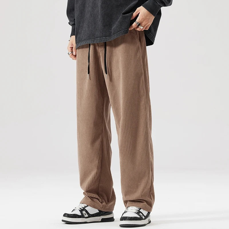 Casual wide leg corduroy pants, ultimate comfort & relaxed fit for any unisex outfit.