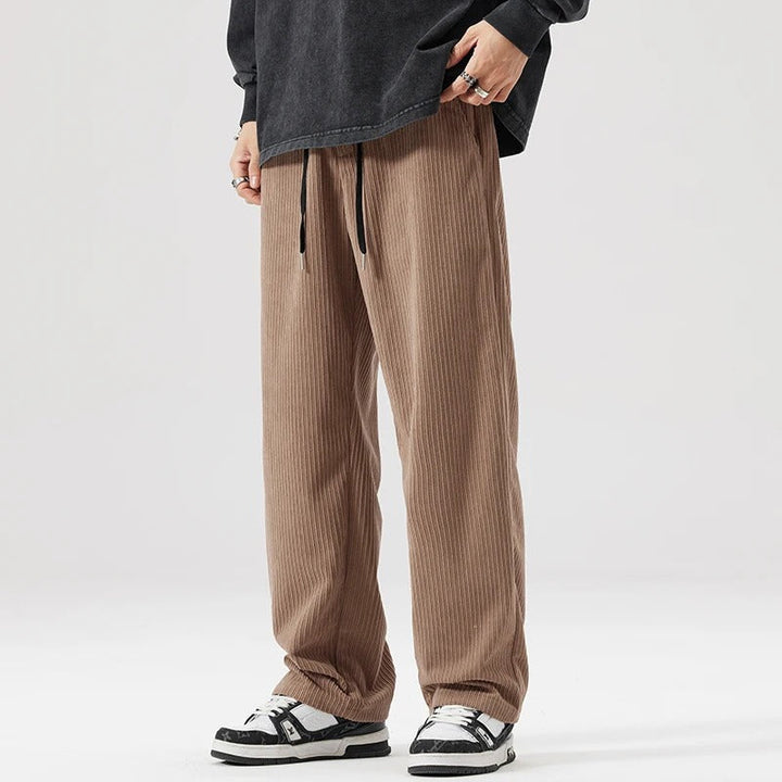 Casual wide leg corduroy pants, ultimate comfort & relaxed fit for any unisex outfit.