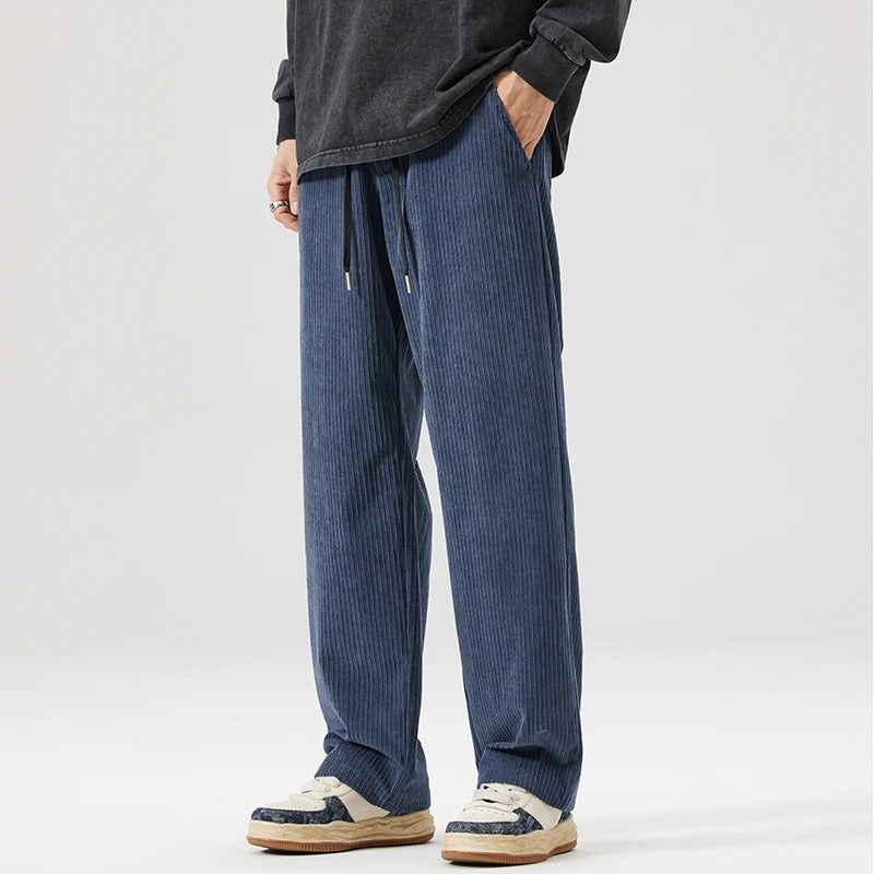 Relaxed fit corduroy pants featuring an adjustable drawstring waist, ideal for soft loungewear.