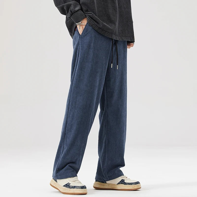 Stylish unisex wide leg corduroy pants, perfect for casual comfort and everyday wear.