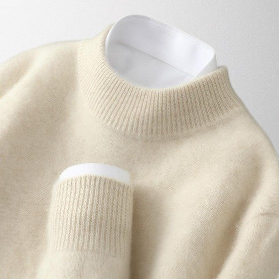 Unisex relaxed fit crew neck pullover in soft cream, perfect for everyday comfort and casual style.