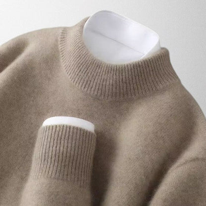 Versatile gray unisex long sleeve crew neck pullover with a relaxed fit, ideal for layering and daily wear.