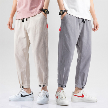 Casual unisex linen blend drawstring trousers, relaxed fit pants for comfortable, breathable summer and everyday wear.