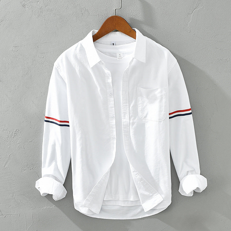 Unisex relaxed fit striped button-up shirt in light fabric, perfect for casual spring/summer wear.