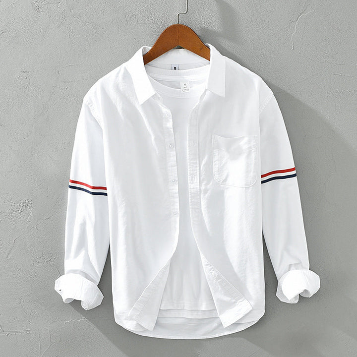 Unisex relaxed fit striped button-up shirt in light fabric, perfect for casual spring/summer wear.