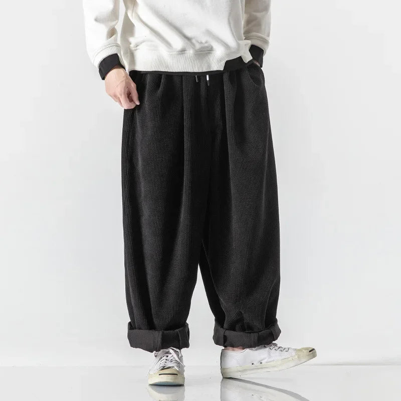 Relaxed fit unisex sweatpants, offering ultimate comfort for casual and loungewear needs.
