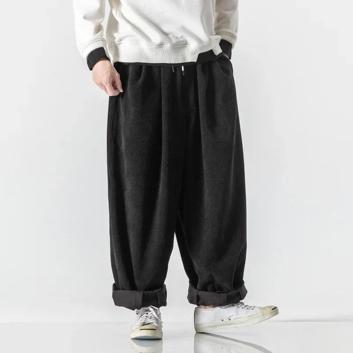 Relaxed fit unisex sweatpants, offering ultimate comfort for casual and loungewear needs.