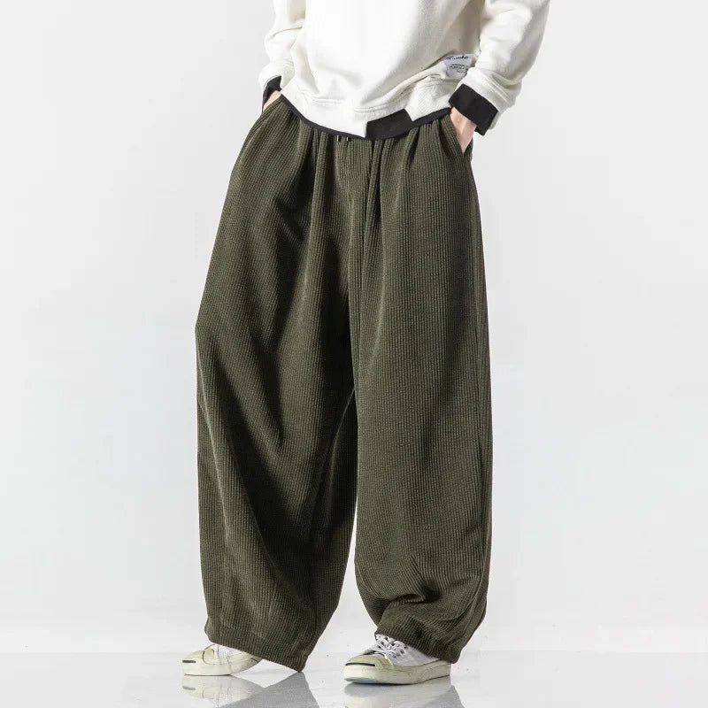 Unisex relaxed fit sweatpants, comfortable bottoms for everyone's everyday style.