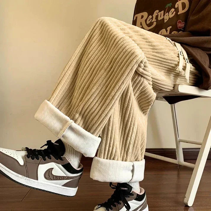 Versatile unisex relaxed fit sweatpants for ultimate everyday comfort. Features a soft fabric and adjustable drawstring.