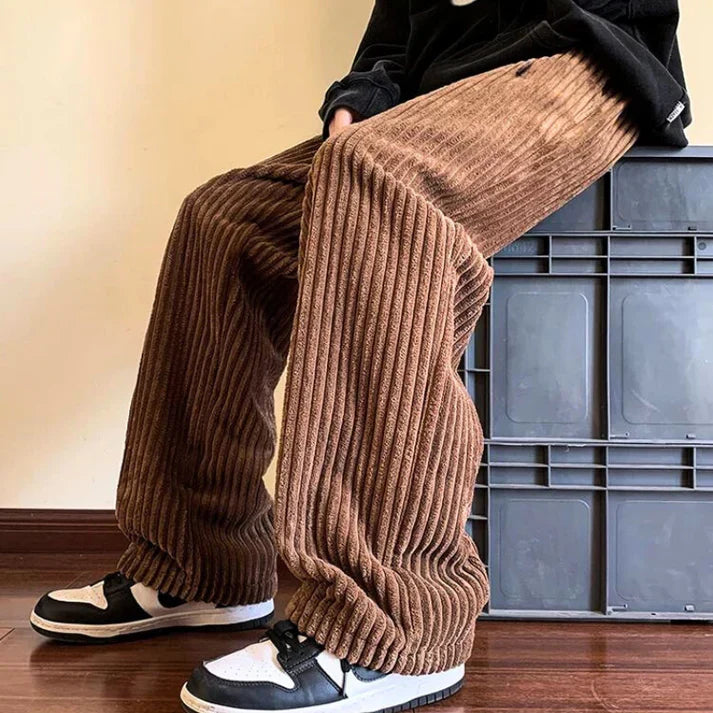 Fashionable unisex relaxed fit wide-leg sweatpants, perfect comfortable bottoms for casual, active, or loungewear styles.