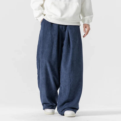 Comfortable unisex wide-leg drawstring pants, ideal for a relaxed fit & vintage 90s style streetwear.