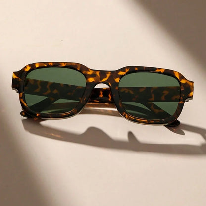 Trendy yellow retro bold frame sunglasses, unisex eyewear for summer style & beachwear with UV protection.