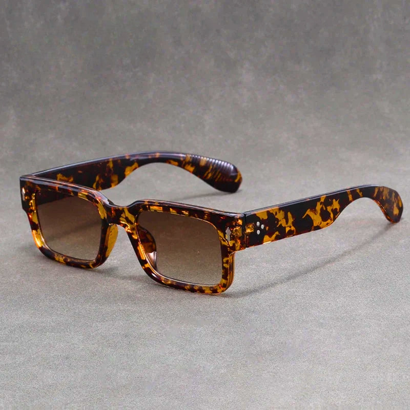 Stylish vintage rectangular sunglasses for men & women, offering fashionable eye protection and a retro look.