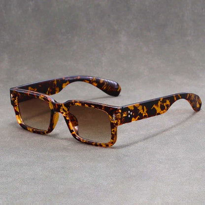 Stylish vintage rectangular sunglasses for men & women, offering fashionable eye protection and a retro look.