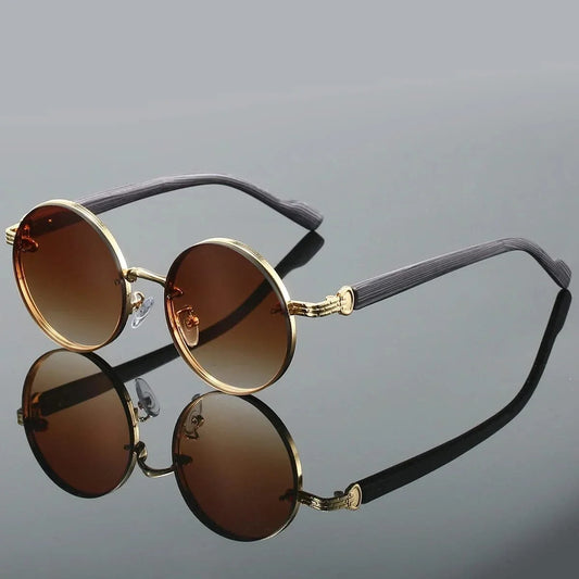 Unisex retro round gradient sunglasses with stylish frames & 100% UV protection. Fashionable eyewear accessory.