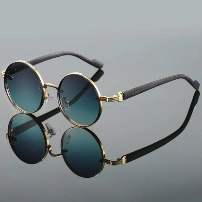Classic retro round sunglasses with modern gradient lenses. Unisex design providing stylish UV protection shades.