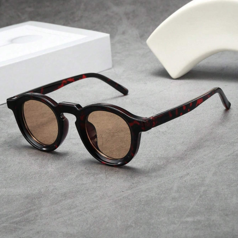 Unisex retro round sunglasses with UV400 protection, classic style for men & women.