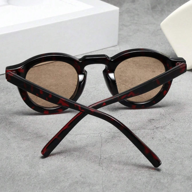Polished acetate retro round sunglasses offering full UV protection.