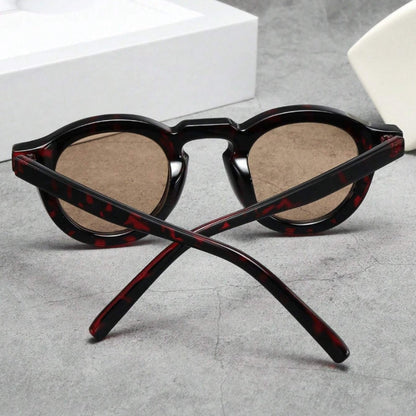Polished acetate retro round sunglasses offering full UV protection.
