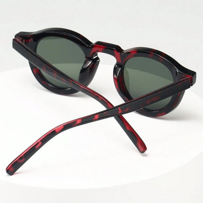 Fashionable unisex round sunglasses, classic retro style with UV protection.