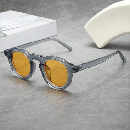 Durable polished acetate retro round sunglasses with reliable UV400 sun protection.