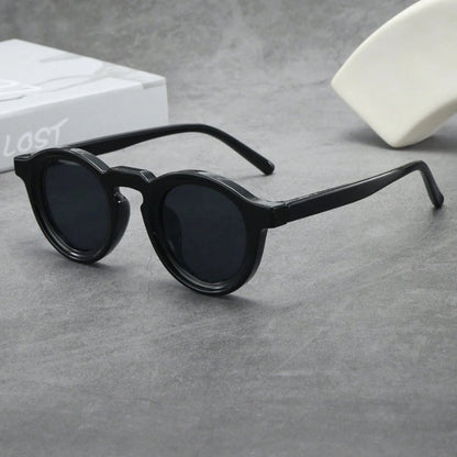 Iconic retro round sunglasses for him & her, premium acetate & UV protection.